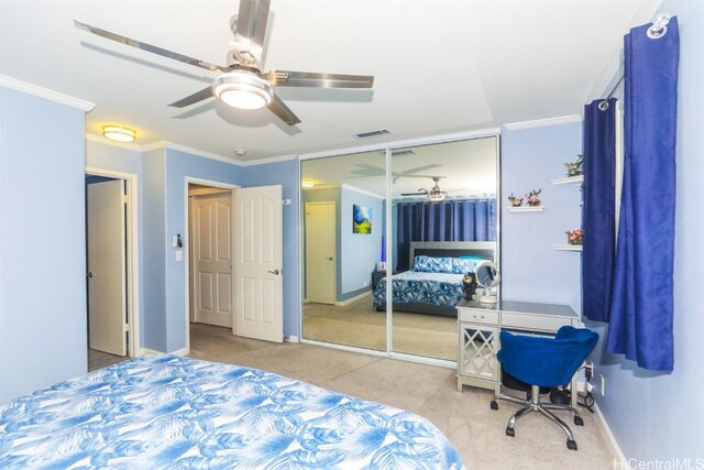 bedroom featuring a closet, ceiling fan, and ornamental molding