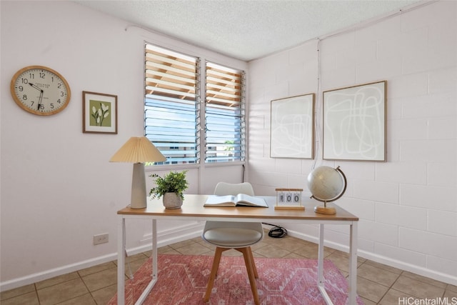 office featuring tile patterned floors and a textured ceiling