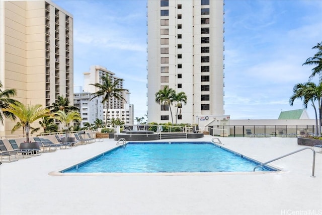 view of pool featuring a patio area