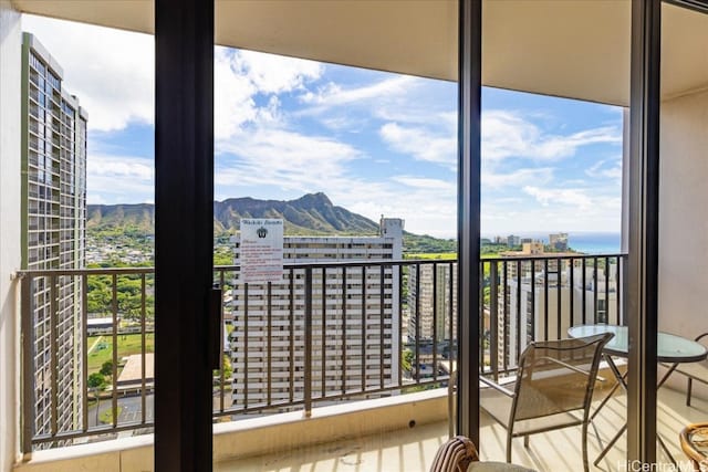 balcony featuring a mountain view