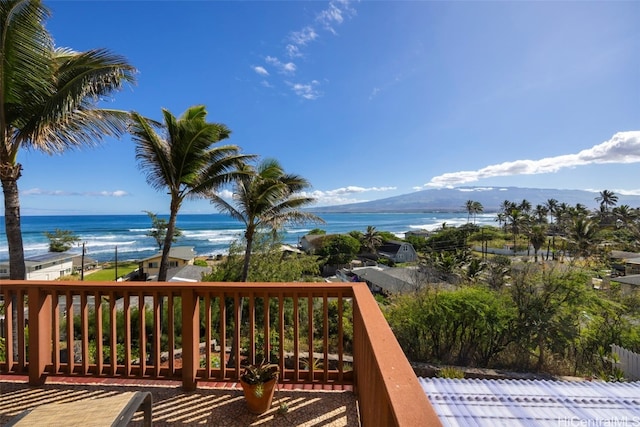 wooden deck with a water view