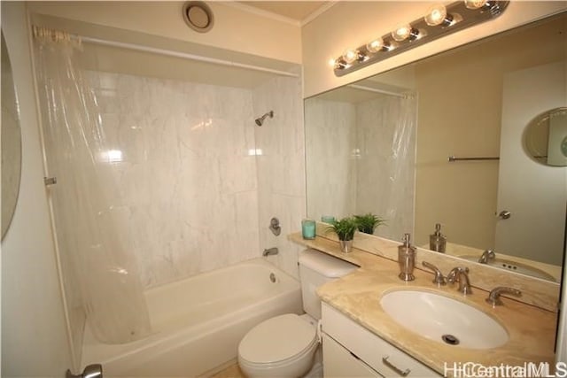 full bathroom with shower / bath combo, vanity, and toilet