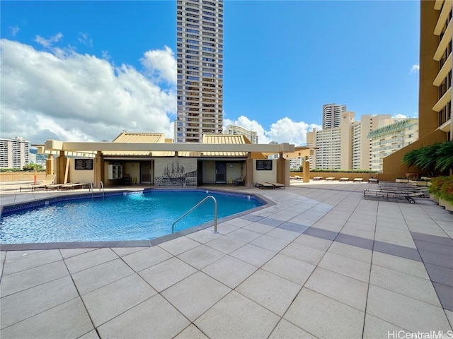 view of pool featuring a patio area