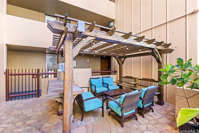 view of patio / terrace with a pergola and an outdoor living space