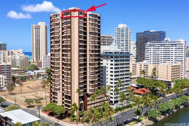 view of building exterior with a water view