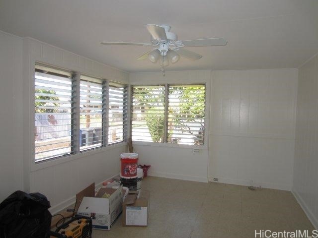 interior space featuring ceiling fan