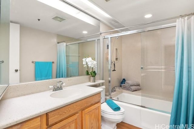 full bathroom with toilet, recessed lighting, vanity, and shower / bathtub combination