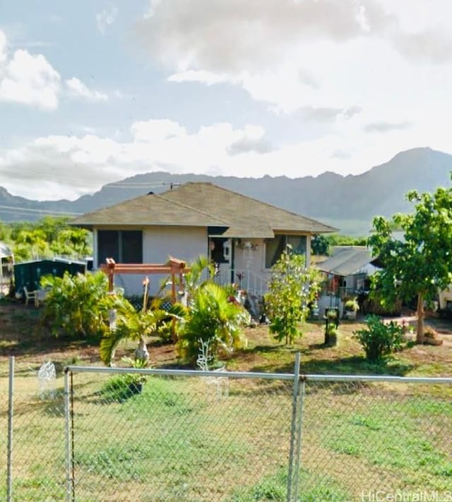 view of front facade featuring a mountain view