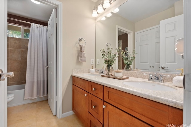 bathroom with tile patterned floors, vanity, and shower / bathtub combination with curtain