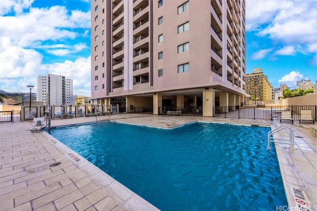 view of pool featuring a patio