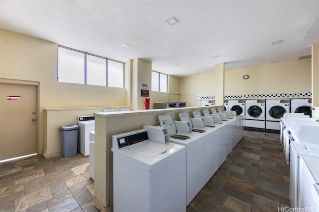 washroom featuring washer and clothes dryer