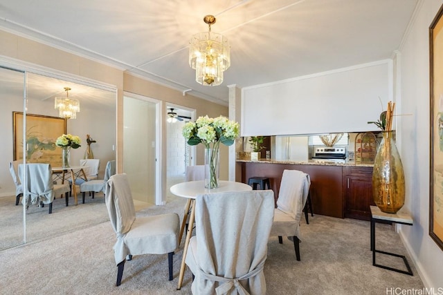 carpeted dining space featuring ceiling fan with notable chandelier and crown molding