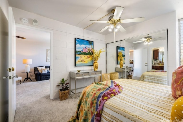 bedroom with light carpet, a closet, and ceiling fan