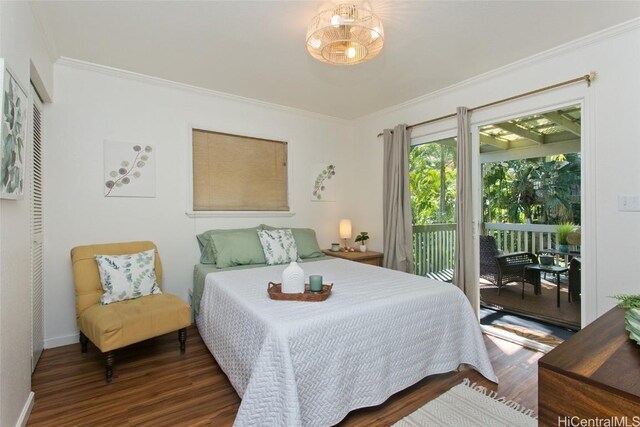 bedroom with ornamental molding, access to exterior, and dark hardwood / wood-style flooring