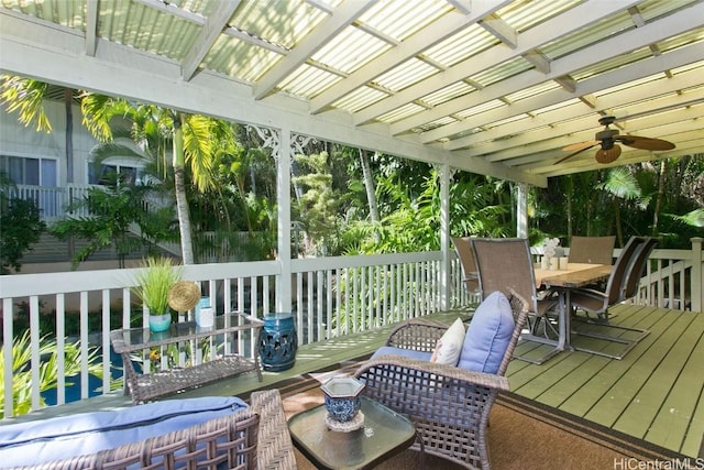 sunroom / solarium with ceiling fan