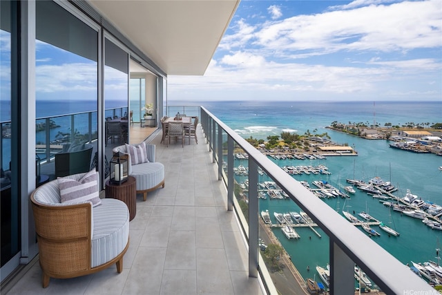 balcony featuring a water view