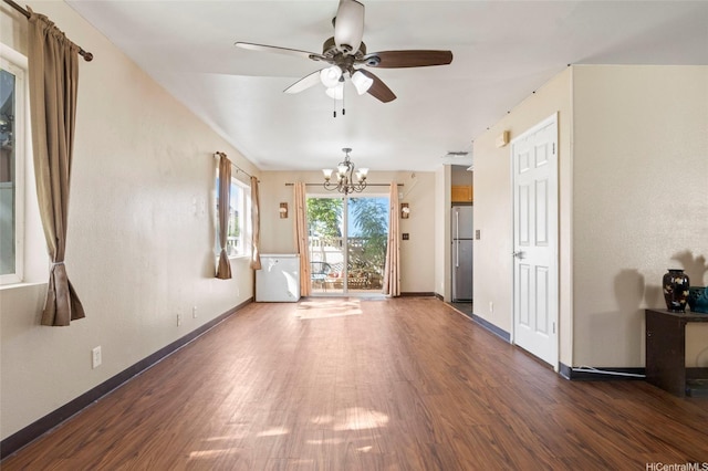 87-1958 Pakeke St Unit G, Waianae, HI 96792 - spare room with wood finished floors, a chandelier, ceiling fan, and baseboards