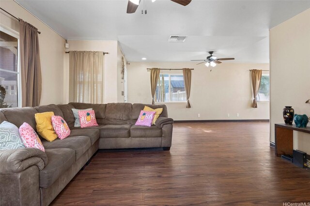 87-1958 Pakeke St Unit G, Waianae, HI 96792 - living area with a ceiling fan, wood finished floors, and baseboards
