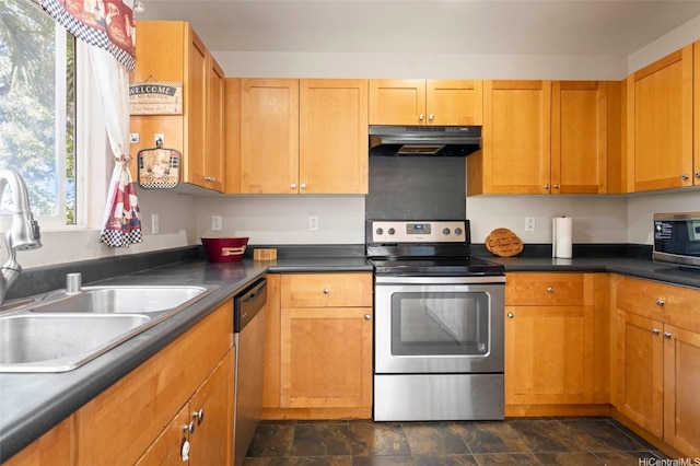 87-1958 Pakeke St Unit G, Waianae, HI 96792 - kitchen with stainless steel appliances, exhaust hood, a sink, and dark countertops