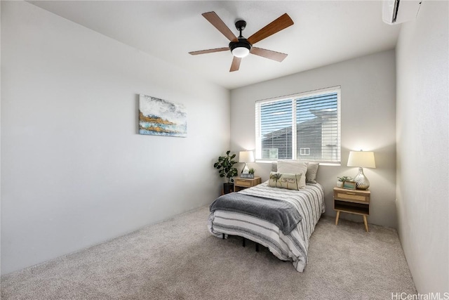 carpeted bedroom featuring ceiling fan and a wall mounted AC