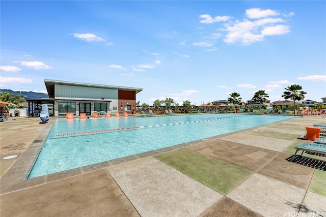 view of pool featuring a patio