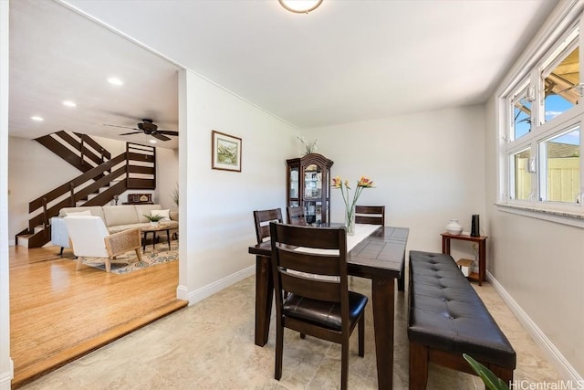 dining area featuring ceiling fan