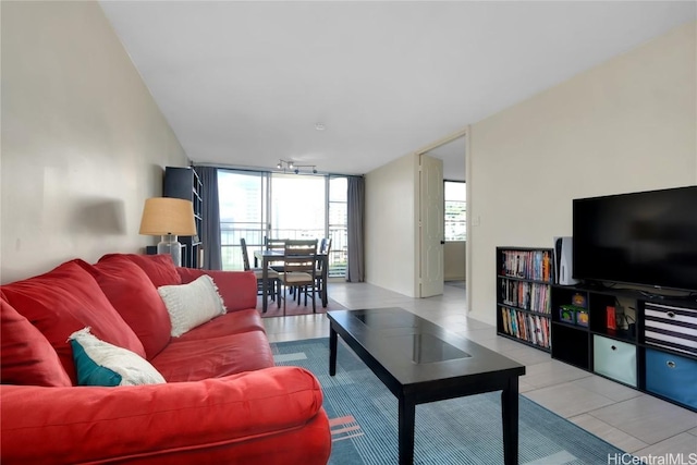 living room with floor to ceiling windows