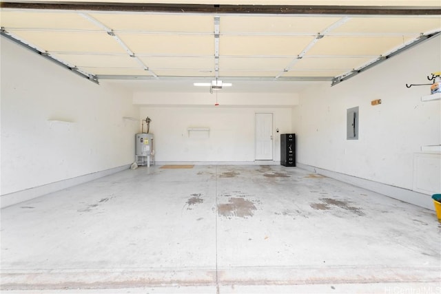 garage featuring electric water heater and electric panel