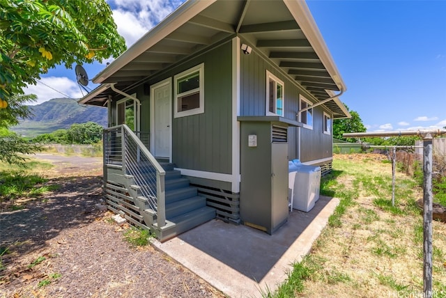 exterior space featuring a mountain view