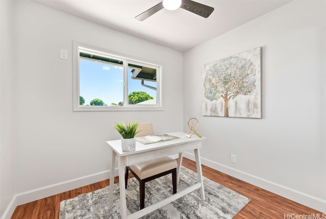 office space with hardwood / wood-style flooring and ceiling fan