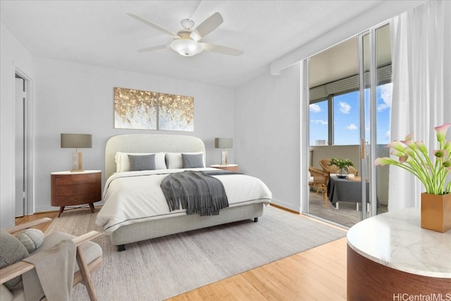 bedroom with ceiling fan, light hardwood / wood-style floors, and access to outside