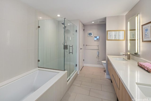 full bathroom featuring tile patterned flooring, vanity, toilet, and shower with separate bathtub