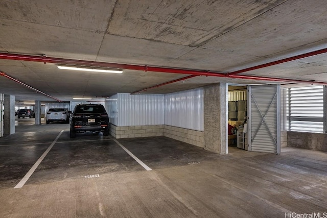 garage featuring a carport