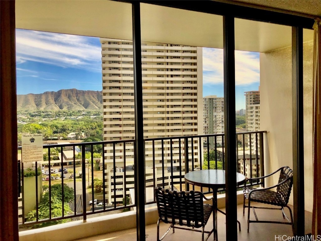 balcony featuring a mountain view