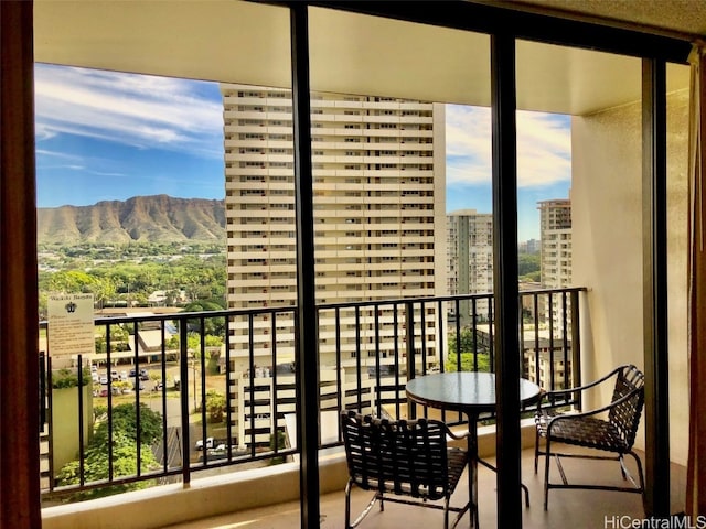 balcony featuring a mountain view