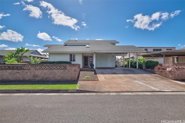 view of front facade with a carport