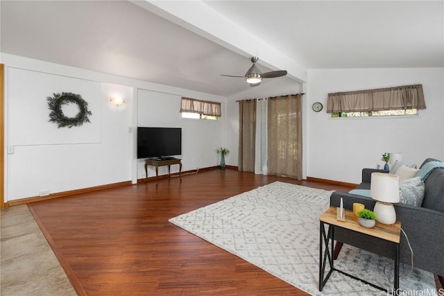 living room featuring ceiling fan, hardwood / wood-style floors, and vaulted ceiling with beams