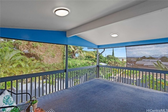 wooden deck with a water view