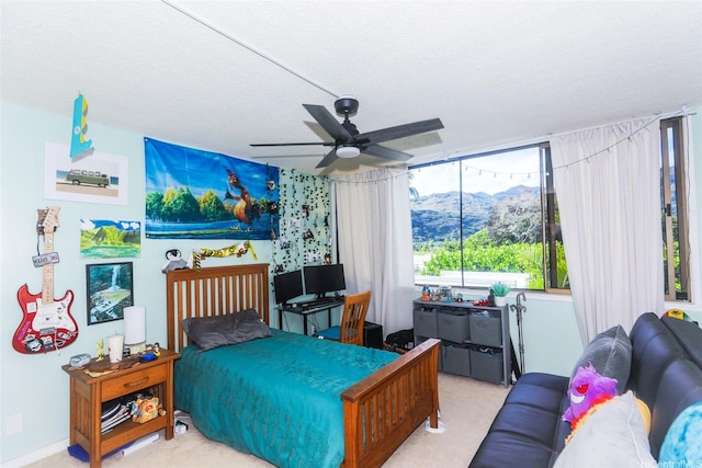 6770 Hawaii Kai Dr Unit 24, Honolulu, HI 96825 - carpeted bedroom with a textured ceiling and a ceiling fan