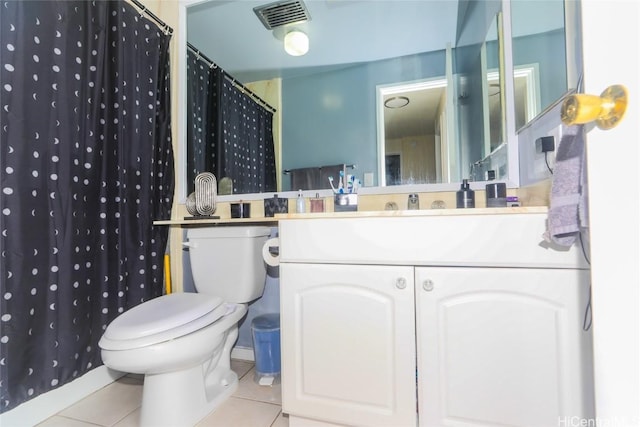 bathroom with walk in shower, tile patterned flooring, vanity, and toilet