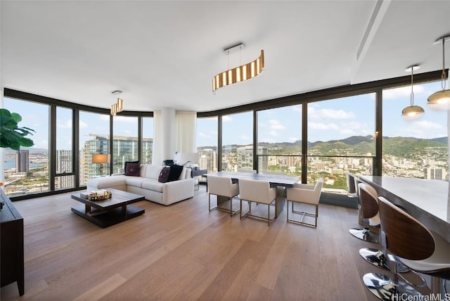 sunroom featuring a mountain view