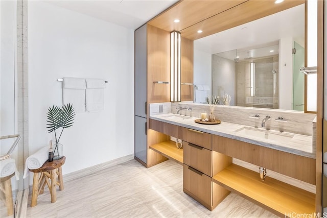 bathroom with vanity, an enclosed shower, and backsplash