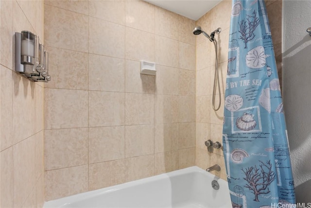 bathroom featuring shower / bathtub combination with curtain