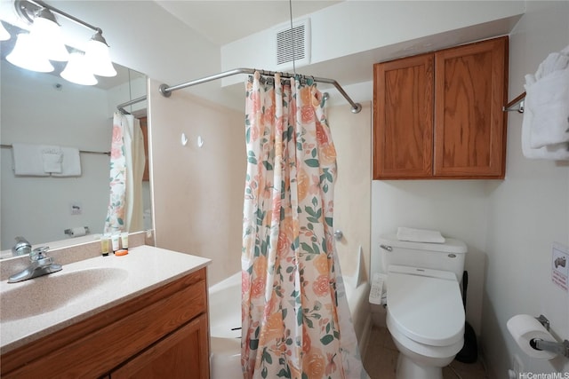 bathroom featuring visible vents, toilet, shower / bath combination with curtain, vanity, and tile patterned flooring