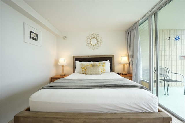 bedroom with access to outside