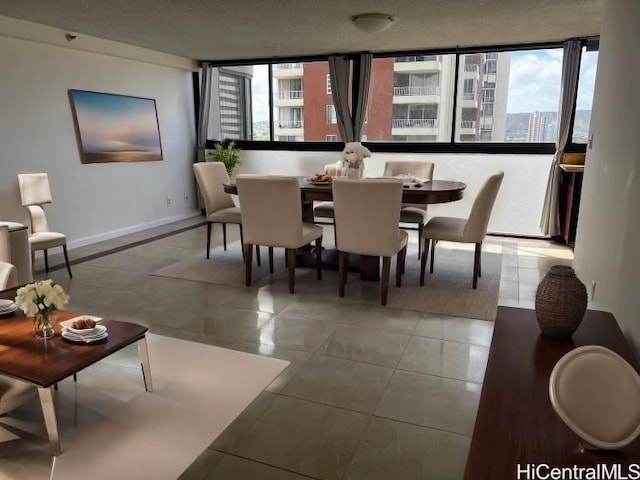 dining space with light tile patterned floors