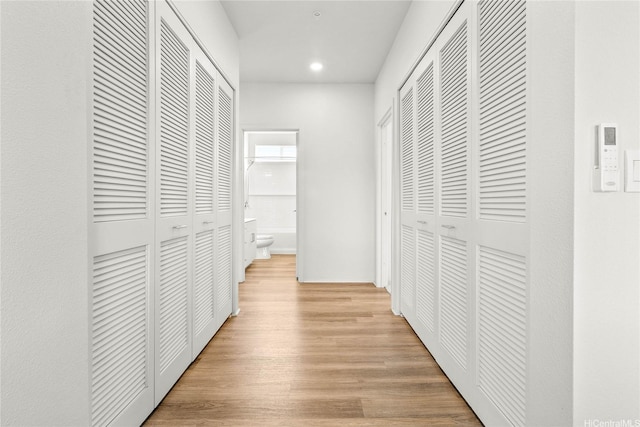 91-3575 Iwikuamoo St Unit 501, Ewa Beach, HI 96706 - hall featuring wood finished floors and recessed lighting