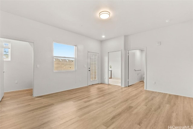 unfurnished room featuring light hardwood / wood-style floors