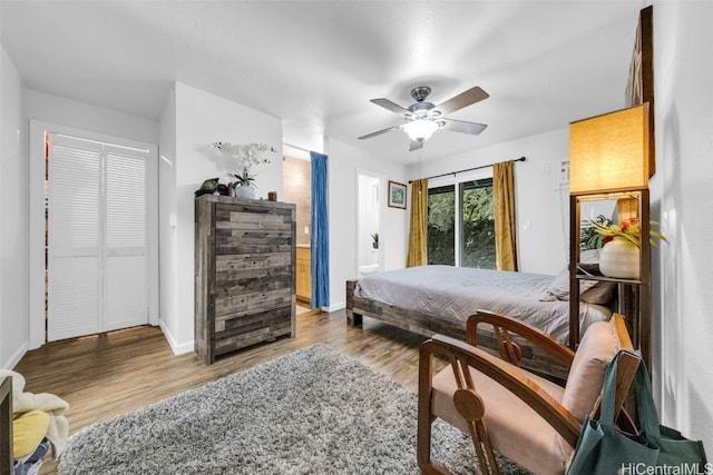 bedroom featuring connected bathroom, ceiling fan, and light hardwood / wood-style floors