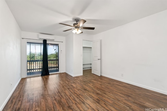 unfurnished room featuring dark hardwood / wood-style floors, a wall unit AC, ceiling fan, and a baseboard heating unit